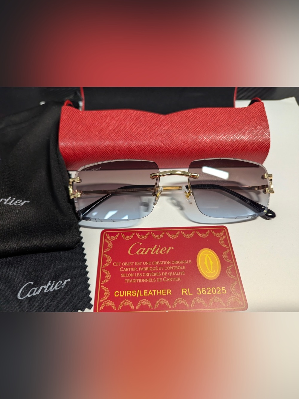 Cartier Men’s Rimless Sunglasses with Gold Accents and Gray Gradient Lenses
